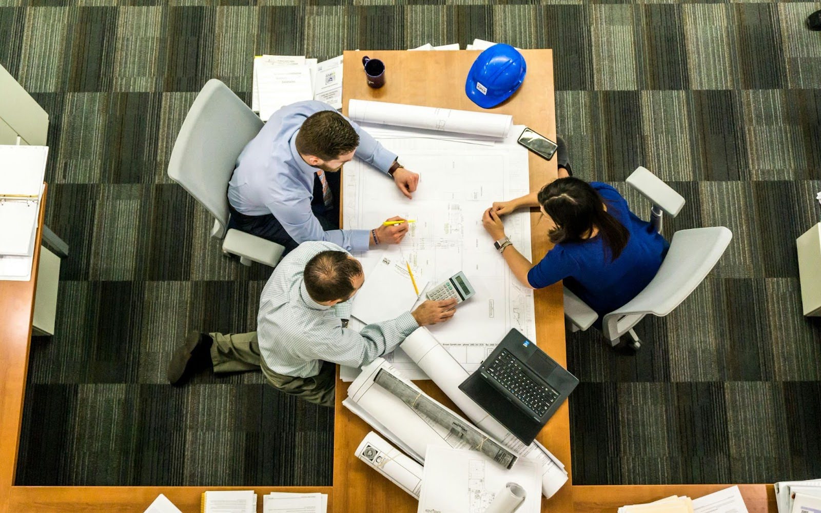 people working around a table